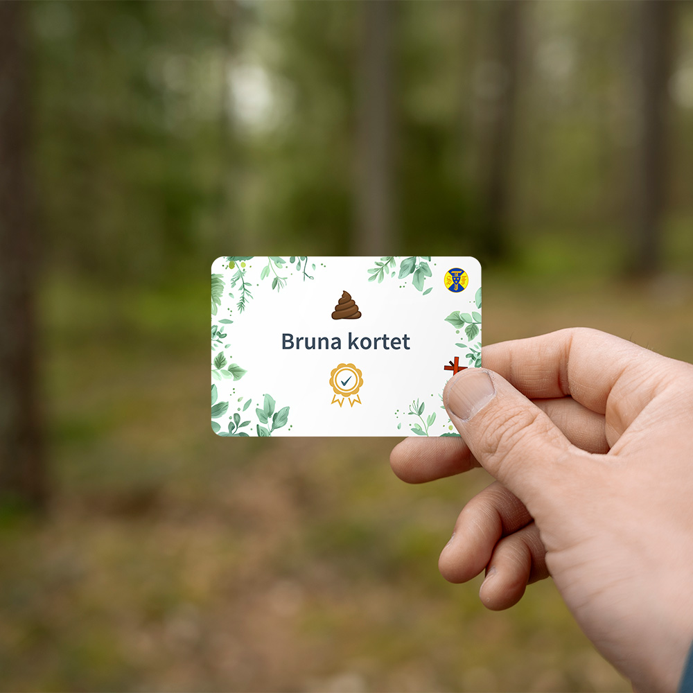 Hand som håller i STFs kort 